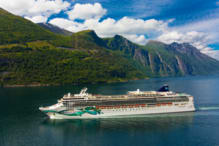 Norwegian Jade sailing through an Alaskan fjord