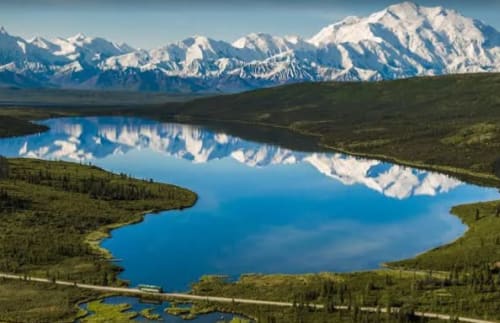 Denali National Park mountains reflected in a lake